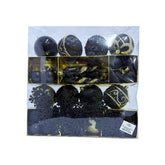 Caja de decoraciones navideñas negro y dorado