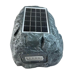 Parlante bluetooth con panel solar en forma de piedra